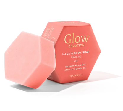 pink hexagonal Luonkos Glow Devotion hand and body soap bar with matching box featuring apricot kernel oil for normal to mature skin, natural vegan formula